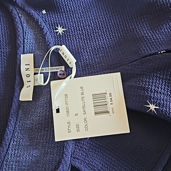 Sioni Sleeveless Ruffle Front Satelite Blue Top With White Stars size Small NWT - Picture 1 of 6